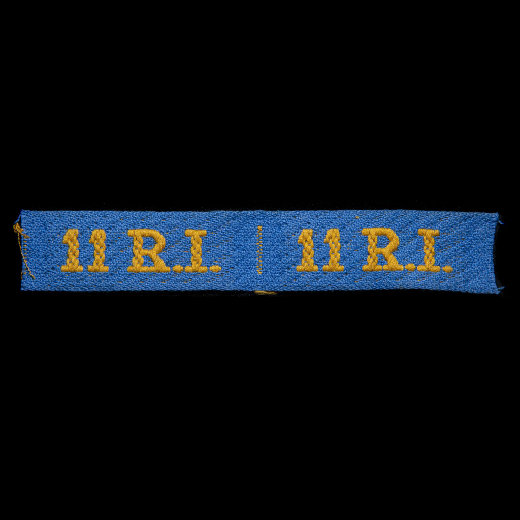 Schouderembleem Korpsonderscheidingsteken 11e Regiment Infanterie