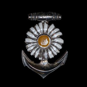 Capbadge Koopvaardij Prinses Margrietfonds