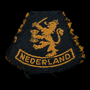 Mouwleeuw model 1940 Nederlandse aanmaak 1945 Brabants weefsel op zwarte ondergrond.