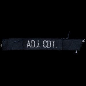 Functieaanduiding gedragen op de mouw – Adj. Cdt.