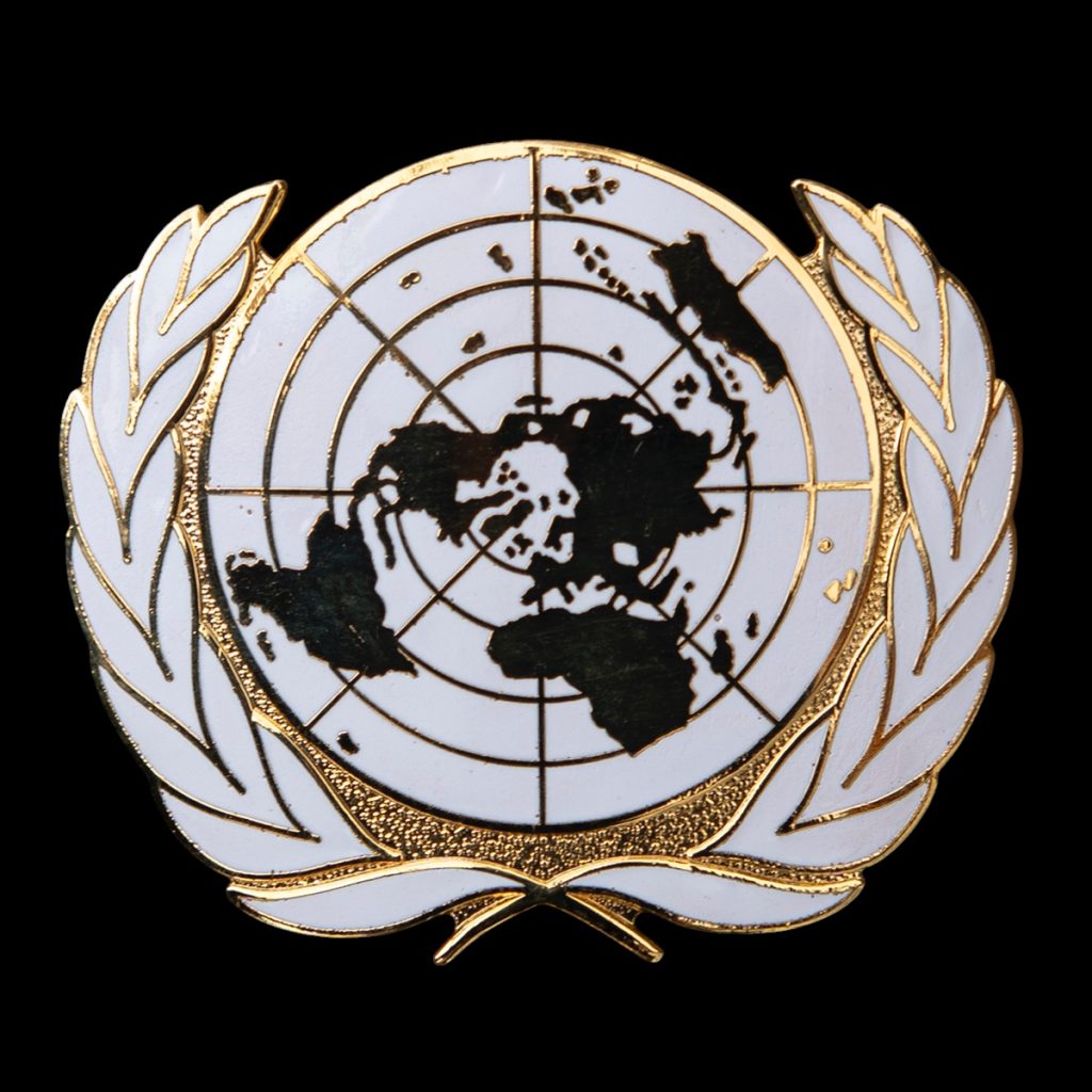 Baret Embleem UN
