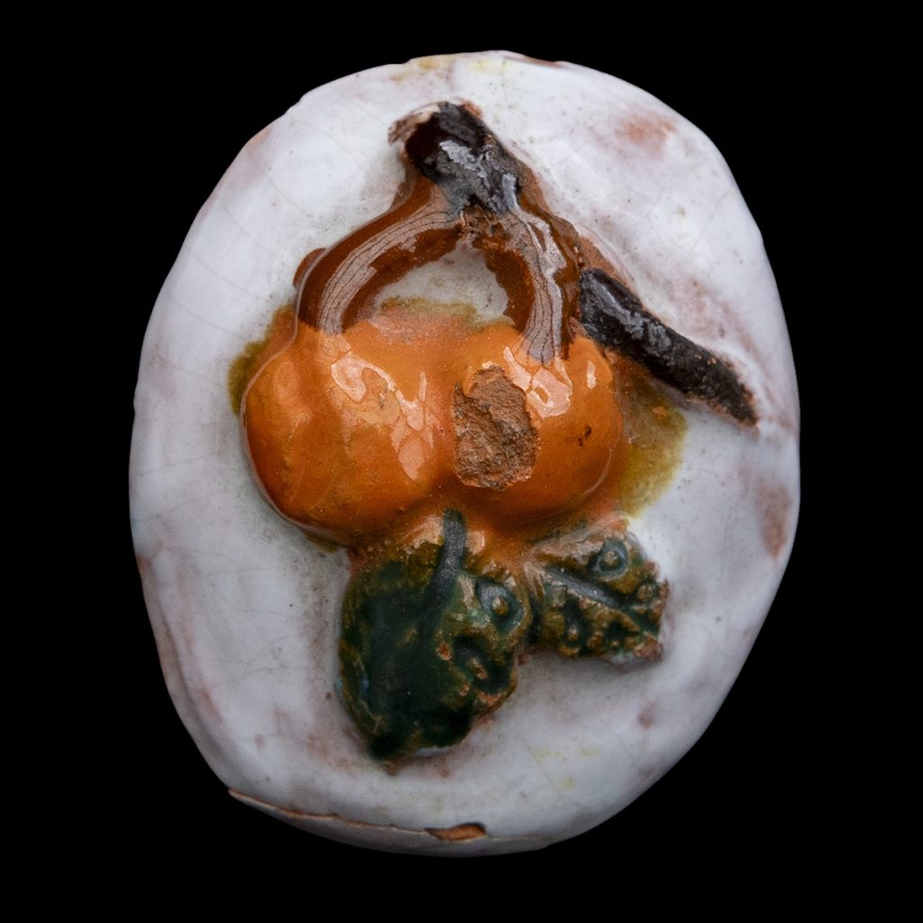 Broche ‘appeltjes van Oranje’