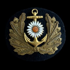 Capbadge Koopvaardij Prinses Margrietfonds