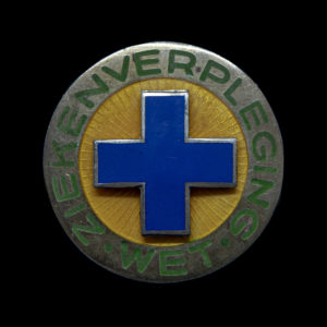 Ziekenverpleging Wet broche